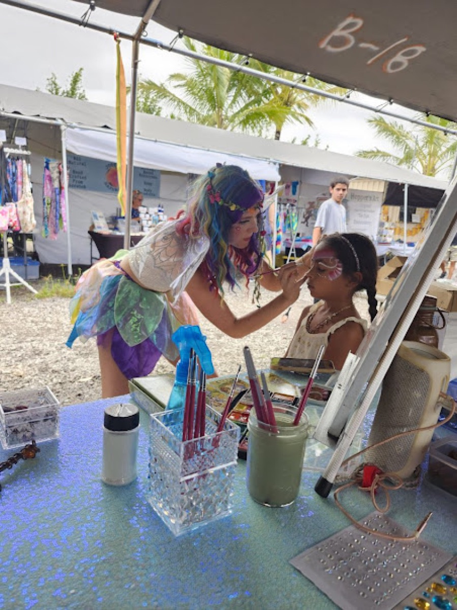 Loni face painting at a live event